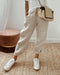 Pantalon en lin beige pour femme avec cordon de serrage