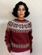 Maglione di lana rosso da donna con motivi nordici