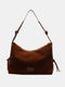 Sac à main en cuir marron avec bandoulière ajustable