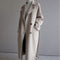 Cappotto lungo in lana beige da donna con cintura
