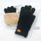 Gants en tricot noir avec doublure en fausse fourrure beige