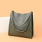 Sac à main en cuir gris avec bandoulière