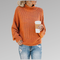 Pull en maille orange à col roulé pour femme