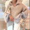Veste en maille à paillettes zippée pour femme