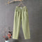 Pantalon en lin vert avec poches pour femme