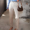 Pantalon Femme Beige Élégant avec Sac à Main Marron