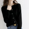 Cardigan en laine noir pour femme avec boutons argentés