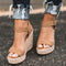 Sandalias de cuña de cuero beige para mujer