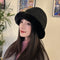 Cappello cloche in lana nero con bordo in pelliccia sintetica