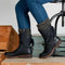 Bottes en cuir noir avec fermeture éclair et revers en tricot