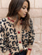 Chaleco de lana beige y negro con estampado de leopardo para mujer