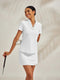 Polo da golf donna con scollo a V e volant UPF50+